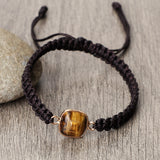 Detail of the handcrafted macrame weaving and Tiger Eye stones in square and oval shapes
