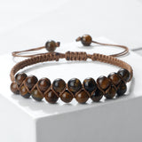 Lifestyle image of a person using a laptop while wearing the Tiger Eye Beaded Bracelet