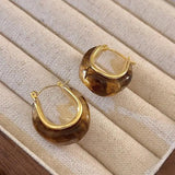Golden Crescent Earrings with Tiger Eye Accent for a Mystical Look
