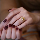 Resizable elegant Tiger Eye ring for women displayed in a luxurious red velvet box