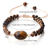 Close-up of the Tiger Eye Charm Bracelet with a central gemstone and adjustable beaded band